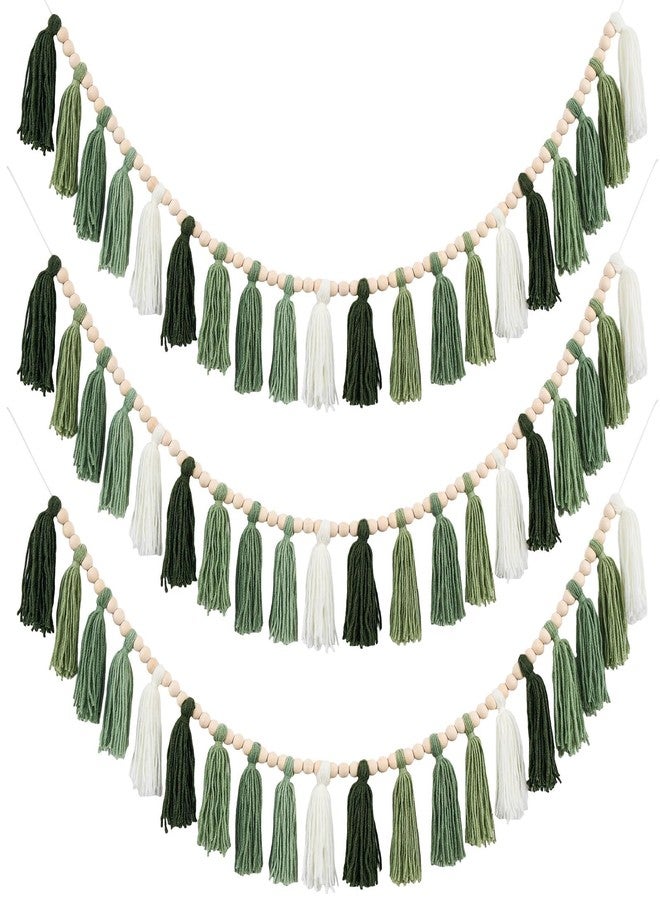ARQRHTLY 3 Pcs Green Boho Yarn Tassel Garlands Sage Green Wall Hanging Decoration with Wood Beads Neutral Woodland Forest Party Tassel Banner for Nursery Classroom Room Dorm Birthday Baby Shower Deco - Image 1